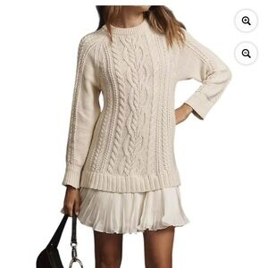 Cream crewneck cable sweater mini dress with pleated skirt